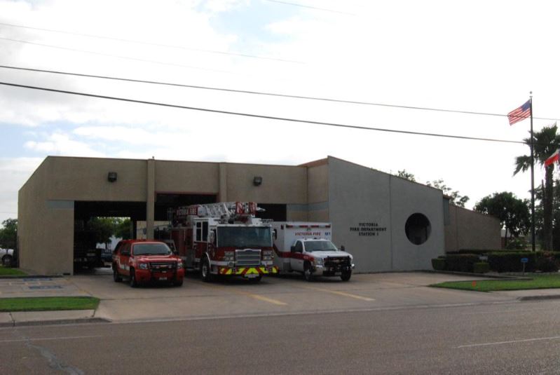 Victoria Fire Department Station 1, with three vehicles parked outside