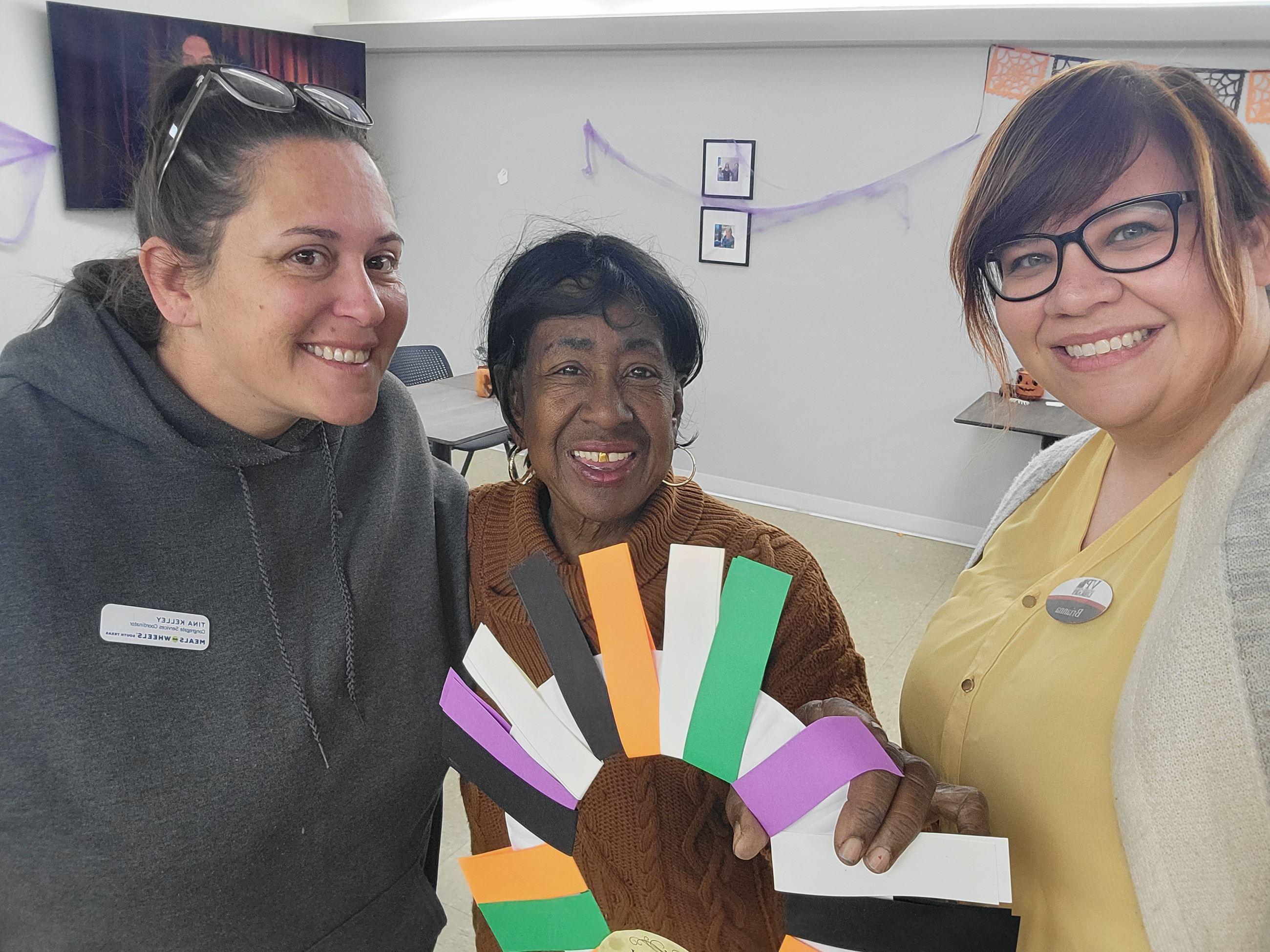 Participants creating paper crafts