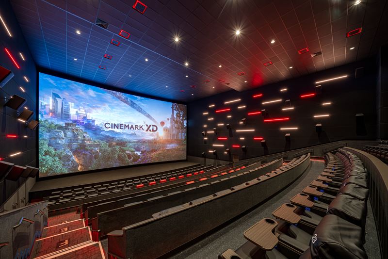 Movie theater with a giant screen that says Cinemark XD