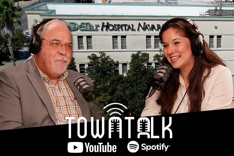 Ashley Strevel and Bernard Leger with DeTar Hospital Navarro background