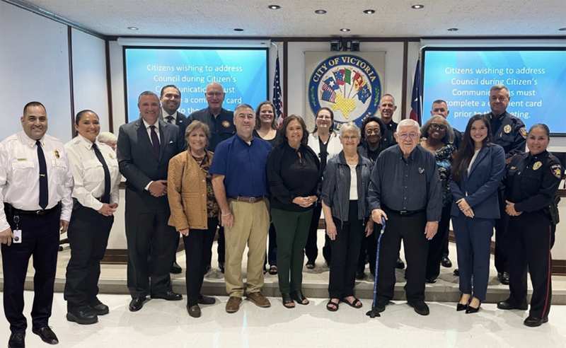 Large group photo at Council chambers with residents and City leaders.